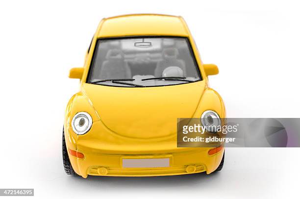 front of yellow car - new beetle stock pictures, royalty-free photos & images