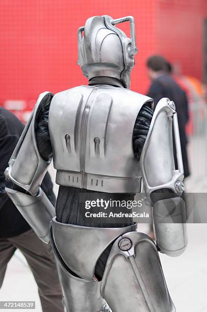 doctor who celebration 2013 - cyberman portrait - doctor saluting stock pictures, royalty-free photos & images