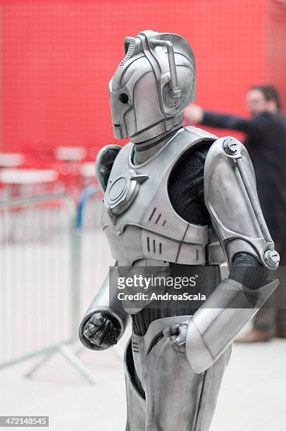 doctor who celebration 2013 - cyberman portrait - doctor saluting stock pictures, royalty-free photos & images