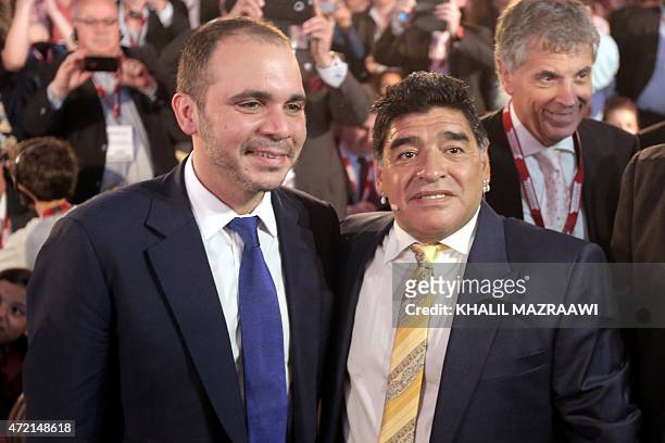 Argentina's legendary ex-footballer Diego Maradona poses next to FIFA vice president and candidate for the presidency, Jordan's Prince Ali bin...