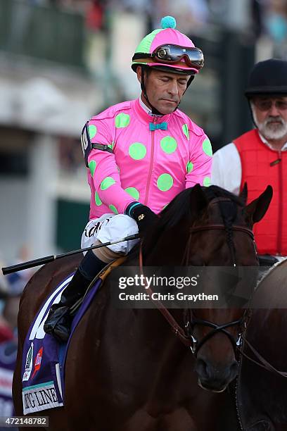 Jockey Gary Stevens guides Firing Line on track prior to the 141st running of the Kentucky Derby at Churchill Downs on May 2, 2015 in Louisville,...