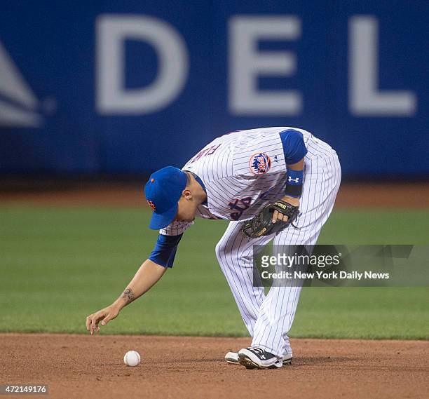 New York Mets vs Washington Nationals @ Citi Field. New York Mets shortstop Wilmer Flores reacts after 4th inning fielding error.