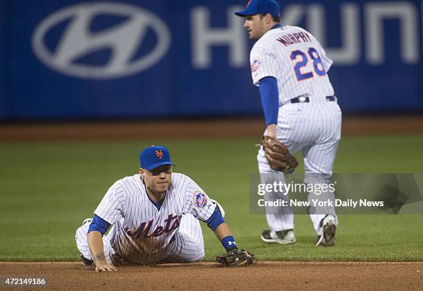 New York Mets vs Washington Nationals @ Citi Field. New York Mets shortstop Wilmer Flores flat on the ground after missing another hit in the 6th...