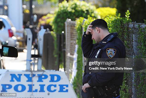 Cop at scene of where an undercover cop was shot in the head yesterday at 212 Street & 104 Ave., Queens.