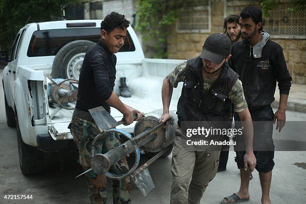 Members of Syrian opposition groups prepare to attack with cannons named "Hell and Fatah" against Assad Regime Forces headquarters in Amiriyah region...