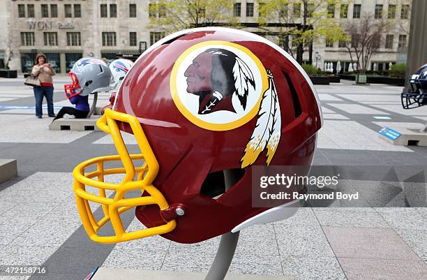 Washington Redskins NFL football helmet is on display in Pioneer Court to commemorate the NFL Draft 2015 in Chicago on April 30, 2015 in Chicago,...