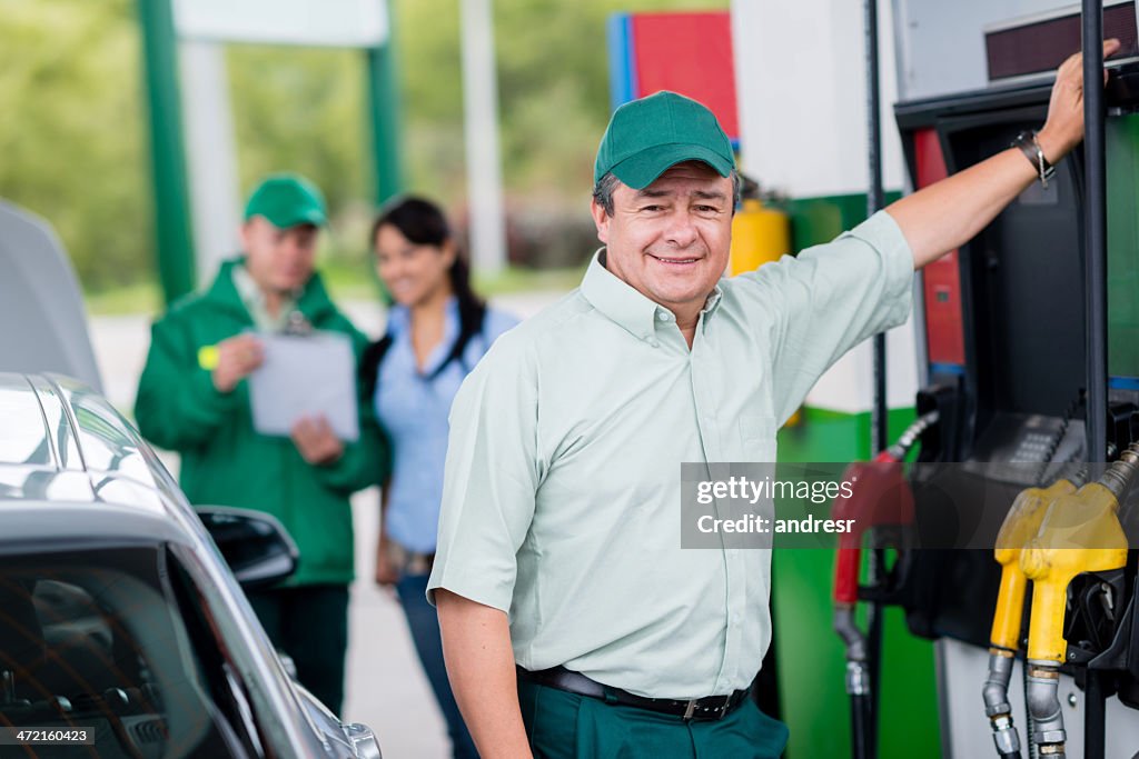 Man working at a gas station