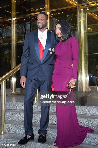 Miami Heat's Dwyane Wade and Actress Gabrielle Union depart the Trump International Hotel for the "China: Through The Looking Glass" Costume...