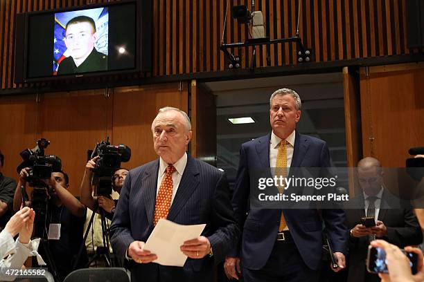 New York City Police Commissioner Bill Bratton enters a news conference with Mayor Bill de Blasio at police headquarters following the death of...