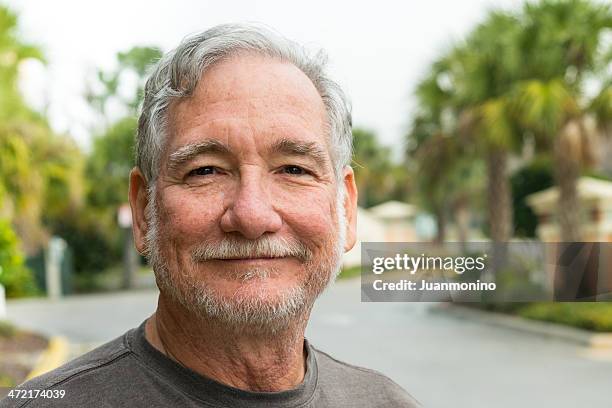 smiling senior man (real people) - 60s man stock pictures, royalty-free photos & images