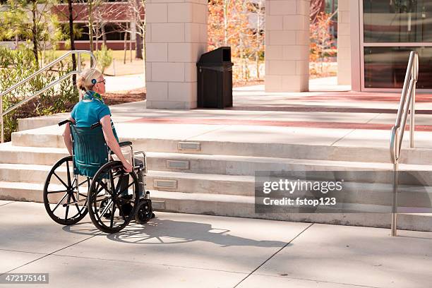 wheelchair-bound woman faces inaccessible stairs. civil rights. - open day 1 stockfoto's en -beelden