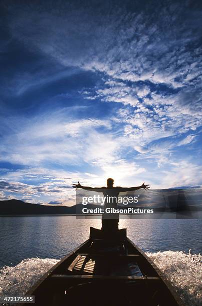 boating at midnight - midnight sun stock pictures, royalty-free photos & images