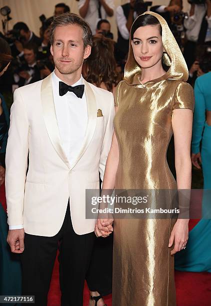 Adam Shulman and Anne Hathaway attend the "China: Through The Looking Glass" Costume Institute Benefit Gala at the Metropolitan Museum of Art on May...