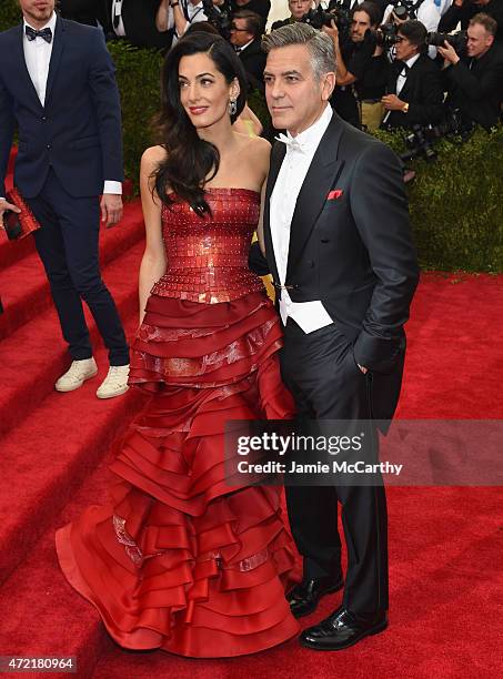 Amal Clooney and George Clooney attend the "China: Through The Looking Glass" Costume Institute Benefit Gala at the Metropolitan Museum of Art on May...