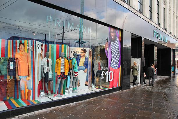 primark clothes store - primark  stock pictures, royalty-free photos & images