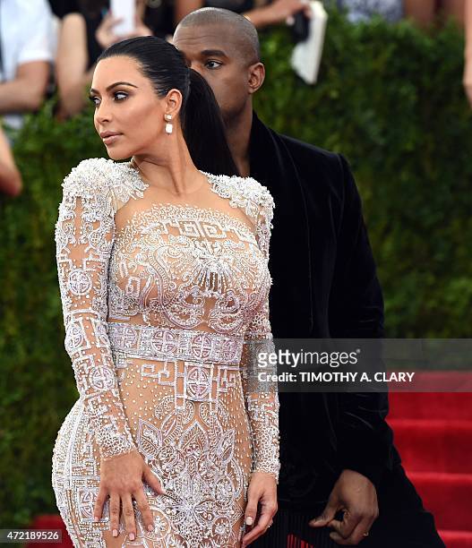 Kim Kardashian and Kanye West arrive at the 2015 Metropolitan Museum of Art's Costume Institute Gala benefit in honor of the museums latest exhibit...