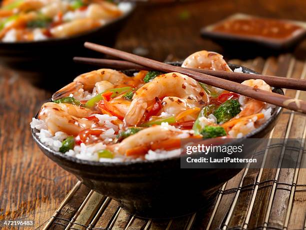 sweet and sour shrimp rice bowl - rice bowl stock pictures, royalty-free photos & images