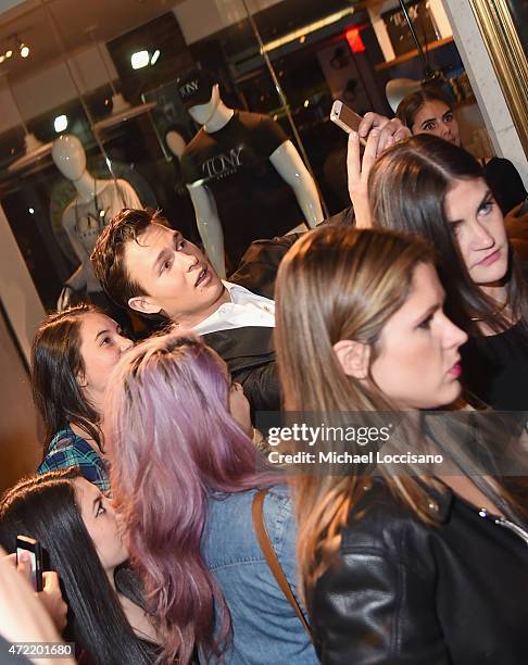 Actor Ansel Elgort takes a selfie with fans while attending an after party hosted by Lady Gaga following the "China: Through The Looking Glass"...