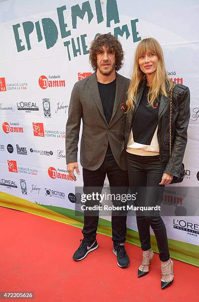 Carles Puyol and Vanessa Lorenzo attend a photocall for 'Epidemia The Game' presentation at the El Palauet on May 4, 2015 in Barcelona, Spain.