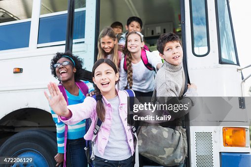Kids Using Bus Children Getting On School Bus High-Res Stock Photo - Getty Images