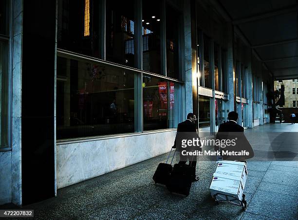 Pedestrians walk past the Reserve Bank of Australia headquarters on May 5, 2015 in Sydney, Australia. Forecasters are predicting the Reserve Bank of...
