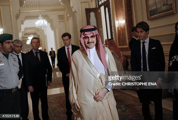 Saudi business magnate and investor Prince Al-Walid bin Talal bin Abdelaziz al-Saud arrives for a meeting with French President Francois Hollande in...