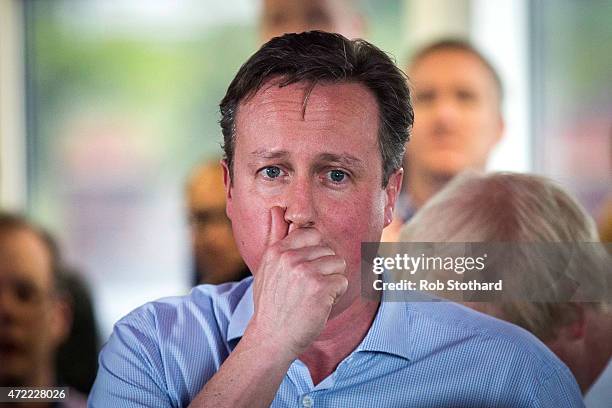 Prime Minister David Cameron speaks to staff at Utility Warehouse on May 5, 2015 in Hendon, England. Campaigning has intensified in the last few days...