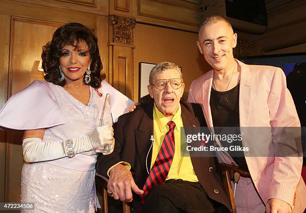 Joan Collins, Jerry Lewis and Alan Cumming at the Friars Club salute to Joan Collins pose at The Friars Club on May 4, 2015 in New York City.