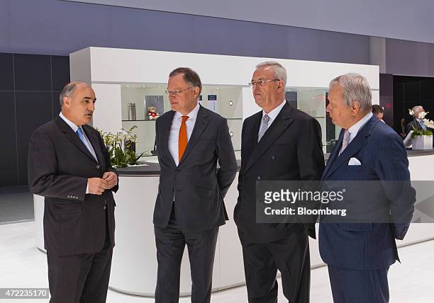 Left to right, Georg Pachta-Reyhofen, chief executive officer of MAN SE, speaks as Stephan Weil, Lower Saxony's prime minister, Martin Winterkorn,...