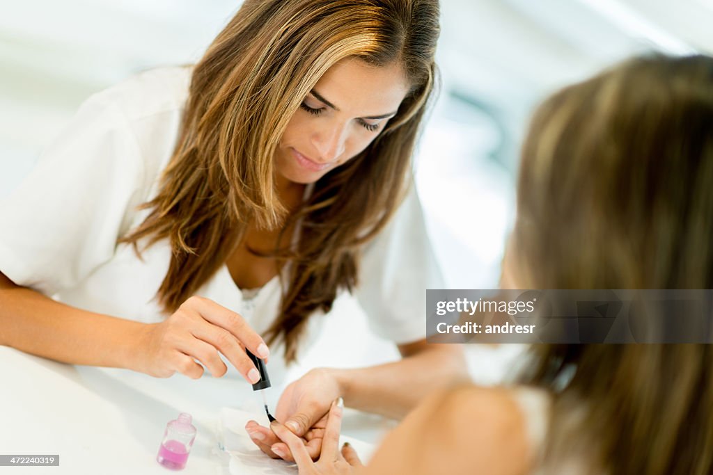 Woman getting a manicure