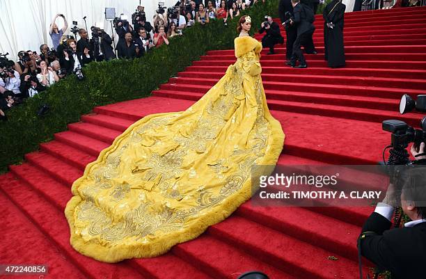 Rihanna arrives at the 2015 Metropolitan Museum of Art's Costume Institute Gala benefit in honor of the museums latest exhibit China: Through the...