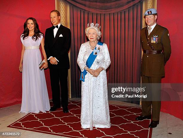 Wax figures of The British Royal Family Catherine, Duchess of Cambridge, Prince William, Duke of Cambridge, Queen Elizabeth II and Prince Harry are...