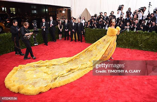 Rihanna arrives at the 2015 Metropolitan Museum of Art's Costume Institute Gala benefit in honor of the museums latest exhibit China: Through the...