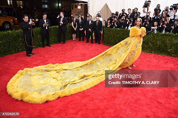 Rihanna arrives at the 2015 Metropolitan Museum of Art's Costume Institute Gala benefit in honor of the museums latest exhibit China: Through the...