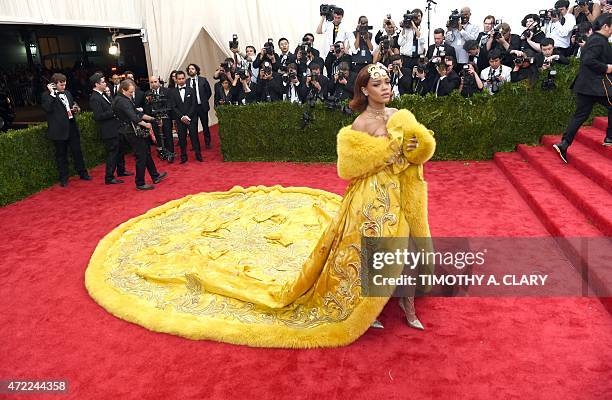 Rihanna arrives at the 2015 Metropolitan Museum of Art's Costume Institute Gala benefit in honor of the museums latest exhibit China: Through the...