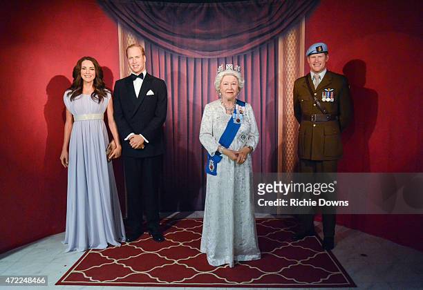 Wax figures of Catherine, Duchess of Cambridge, Prince William, Duke of Cambridge, Queen Elizabeth II and Prince Harry are unveiled as The British...
