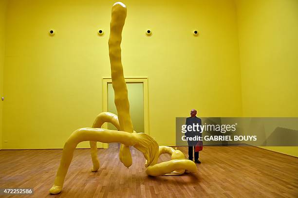 Visitor looks at a creation by British artist Sarah Lucas at the pavilion of Great Britain during the 56th International Art Exhibition titled "All...
