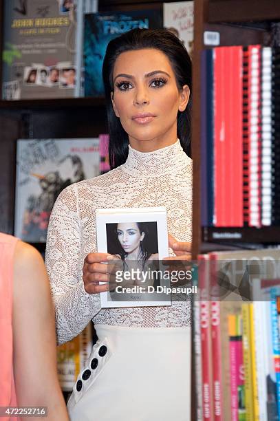 Kim Kardashian promotes her book "Kim Kardashian West: Selfish" at Barnes & Noble, 5th Avenue on May 5, 2015 in New York City.