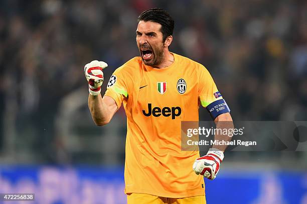 Gianluigi Buffon of Juventus celebrates as Alvaro Morata of Juventus scores their first goal during the UEFA Champions League semi final first leg...