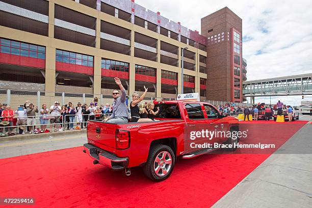 American League All-Star Glen Perkins of the Minnesota Twins waves in the Red Carpet Parade leading to the 85th MLB All-Star Game at Target Field on...