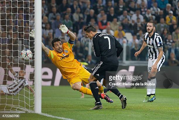 Cristiano Ronaldo of Real Madrid scores a goal during the UEFA Champions League semi finale football match against Juventus between Real Madrid CF at...