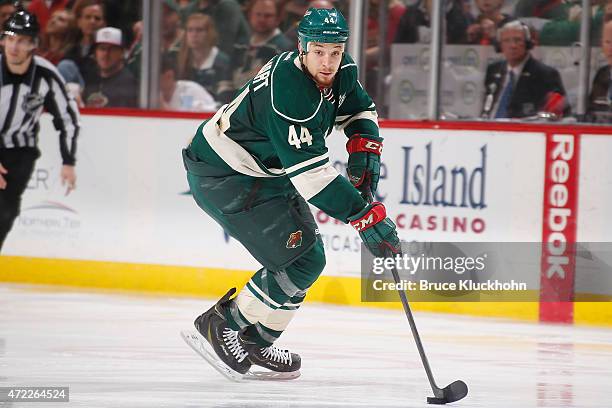 Chris Stewart of the Minnesota Wild skates with the puck against the St. Louis Blues in Game Six of the Western Conference Quarterfinals during the...