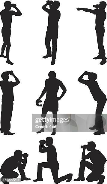 men searching with binoculars - man bird watching stock illustrations