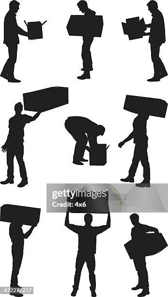men with boxes - lifting heavy objects stock illustrations