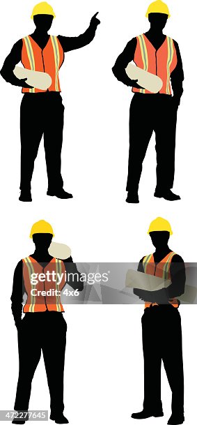 Construction foreman holding plans Construction foreman holding plans