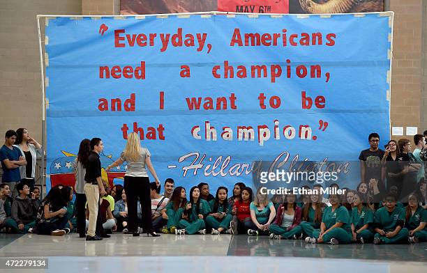 Students gather next to their sign made for Democratic presidential candidate and former U.S. Secretary of State Hillary Clinton at Rancho High...