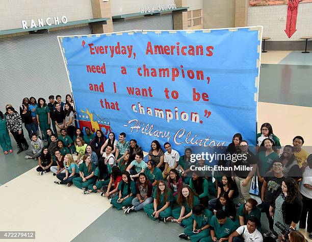 Students gather next to their sign made for Democratic presidential candidate and former U.S. Secretary of State Hillary Clinton at Rancho High...