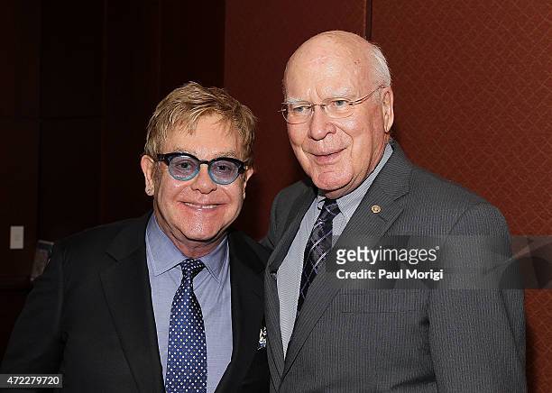 Sir Elton John, Founder, Elton John AIDS Foundation, and event co-host U.S. Sen. Patrick Leahey pose for a photo before an Elton John AIDS Foundation...