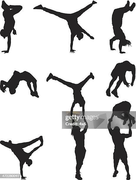 silhouettes break dancing and flipping - modern dance stock illustrations