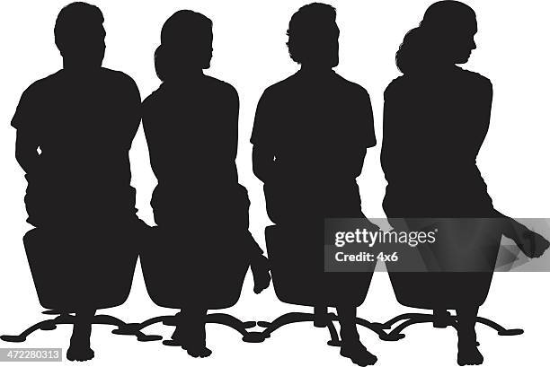 four silhouette people sitting legs crossed - looking sideways stock illustrations